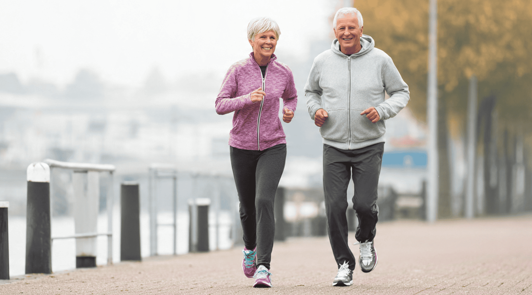 Active older adults walking confidently representing improved function after ESWT in Louisville, KY