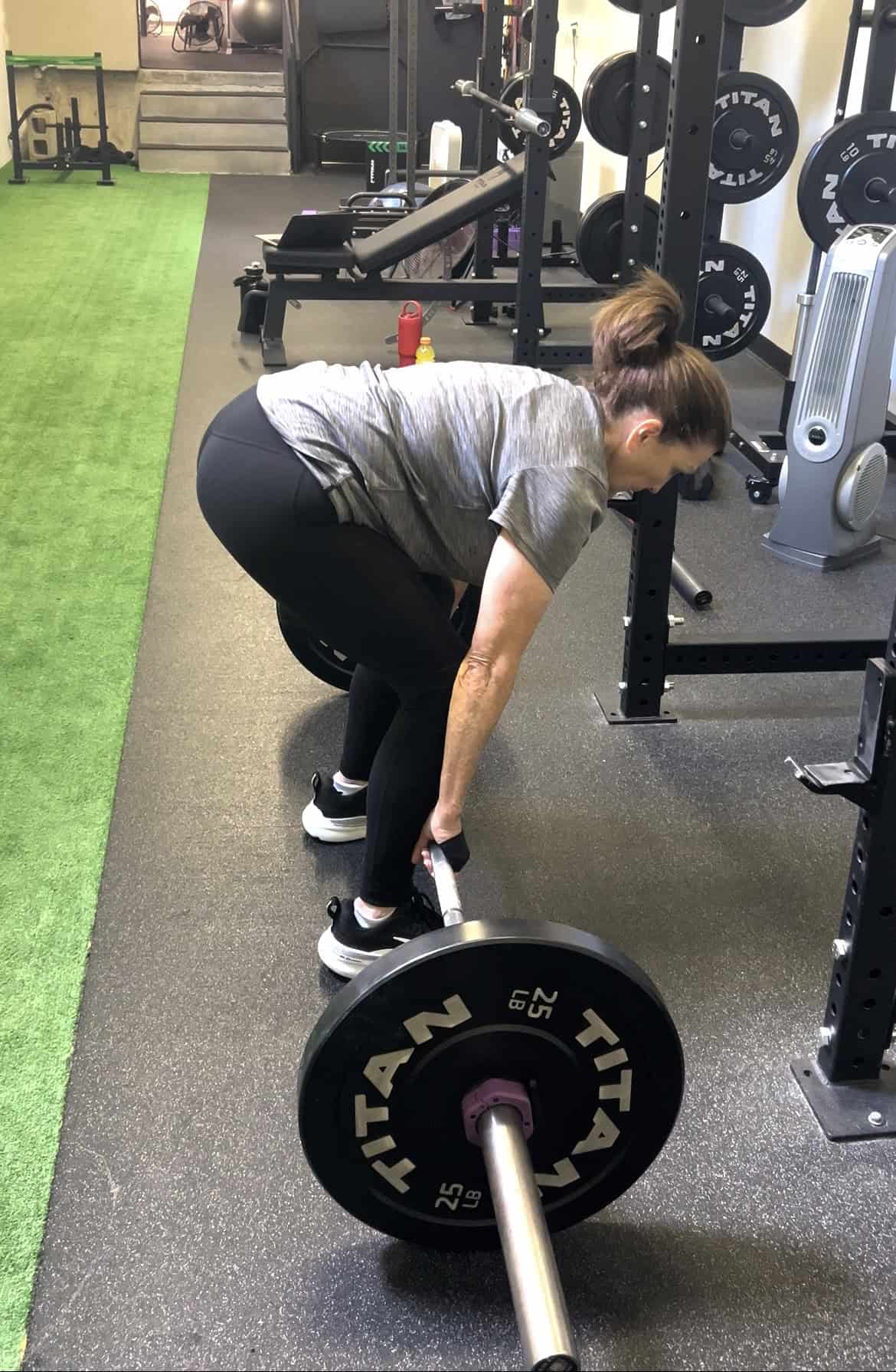 A client performs a coached conventional deadlift at ProActive Physical Therapy and Wellness in Louisville, KY