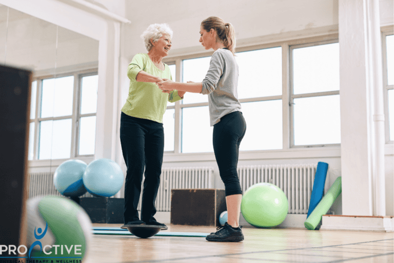 Older adult performing balance therapy exercise under supervision at ProActive Physical Therapy and Wellness in Louisville, KY